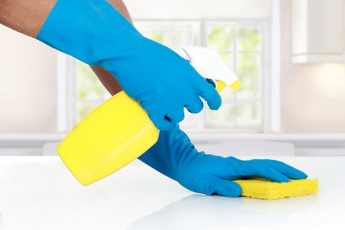 After builders cleaning in SW13 removing dust from a renovated room