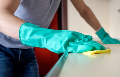 Cleaning service team in SW13 preparing a tidy living space